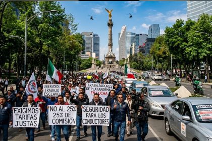 Marcha de trabajadores de Uber y Didi | IA